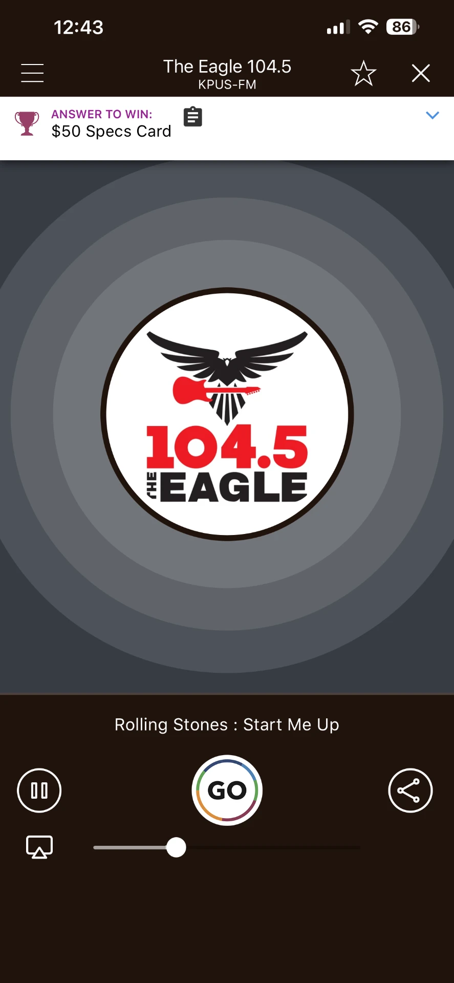 The Eagle 104.5 app player screen with contest banner